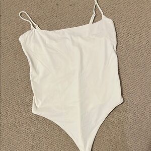 Suuksess White Bodysuit One Piece with Minimalist Design